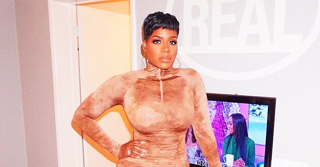 Fantasia Barrino Stuns her Fans by Flaunting in Killer Curves in Tight Burgundy Dress & Gray Jeans 3 Months after Giving Birth.