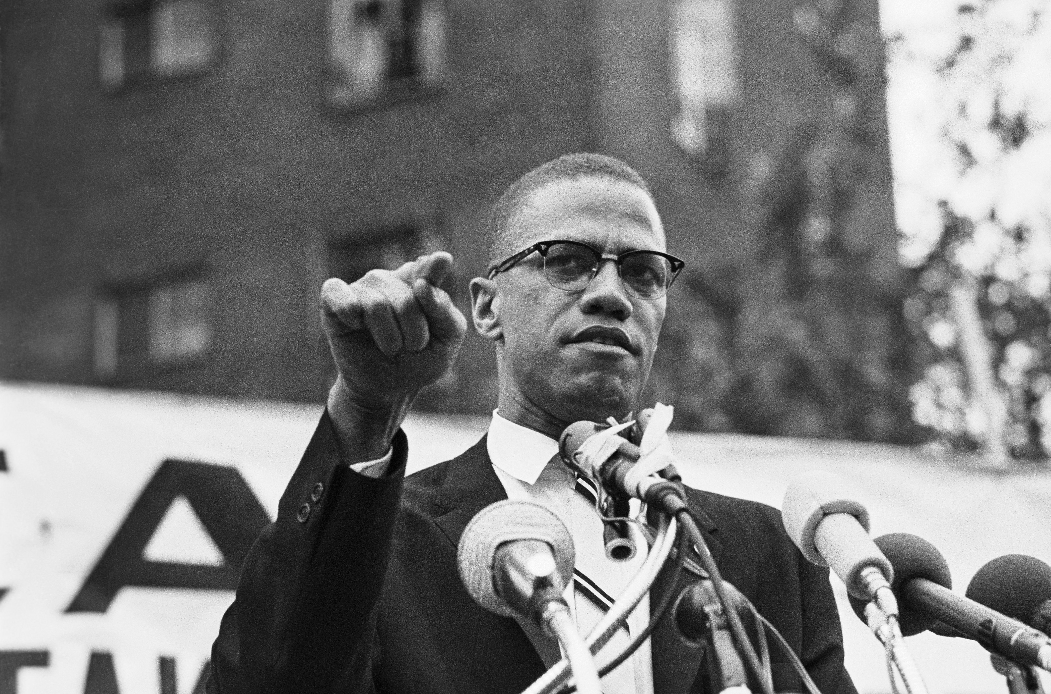 Nation of Islam leader Malcolm X speaking at a rally | Source: Getty Images