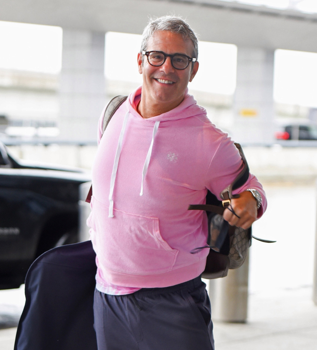 *EXCLUSIVE* Andy Cohen is in good spirits for his morning flight at JFK airport in NYC!