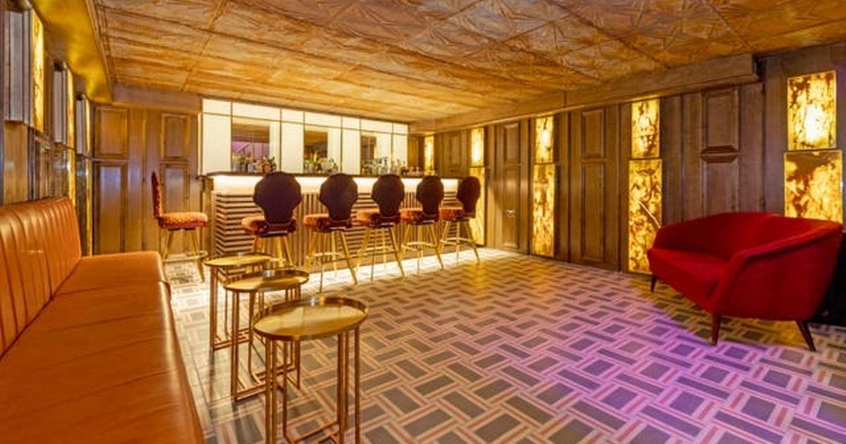 The extraordinary £1.9 million property of a Madness singer is up for sale, complete with a ‘all-gold basement bar.’