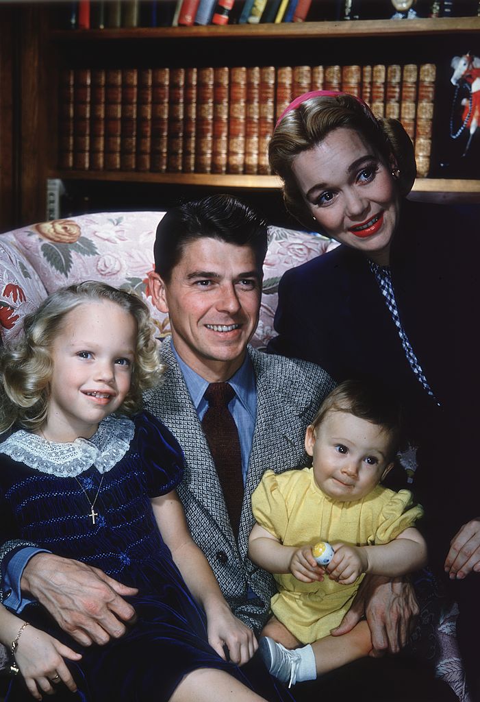 Portrait of married couple Ronald Reagan and Jane Wyman with their two children, Maureen (1941 - 2001) and Michael. | Source: Getty Images