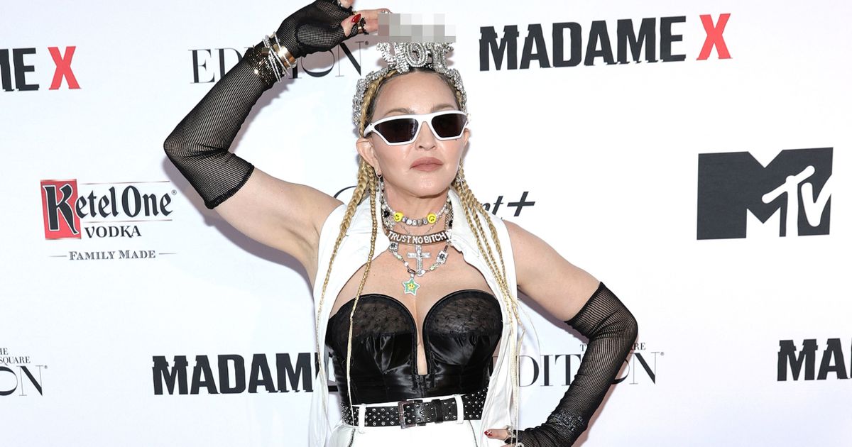 Madonna, 63, wows as she flashes cleavage in bustier and fishnet tights for racy display