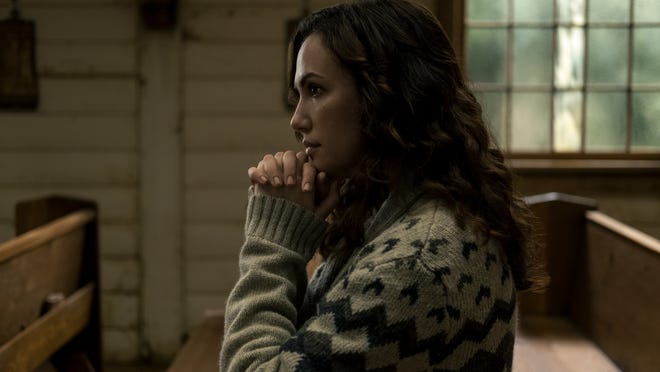 Erin (Kate Siegel) is wary of the fundamentalism gaining steam in her town in "Midnight Mass."