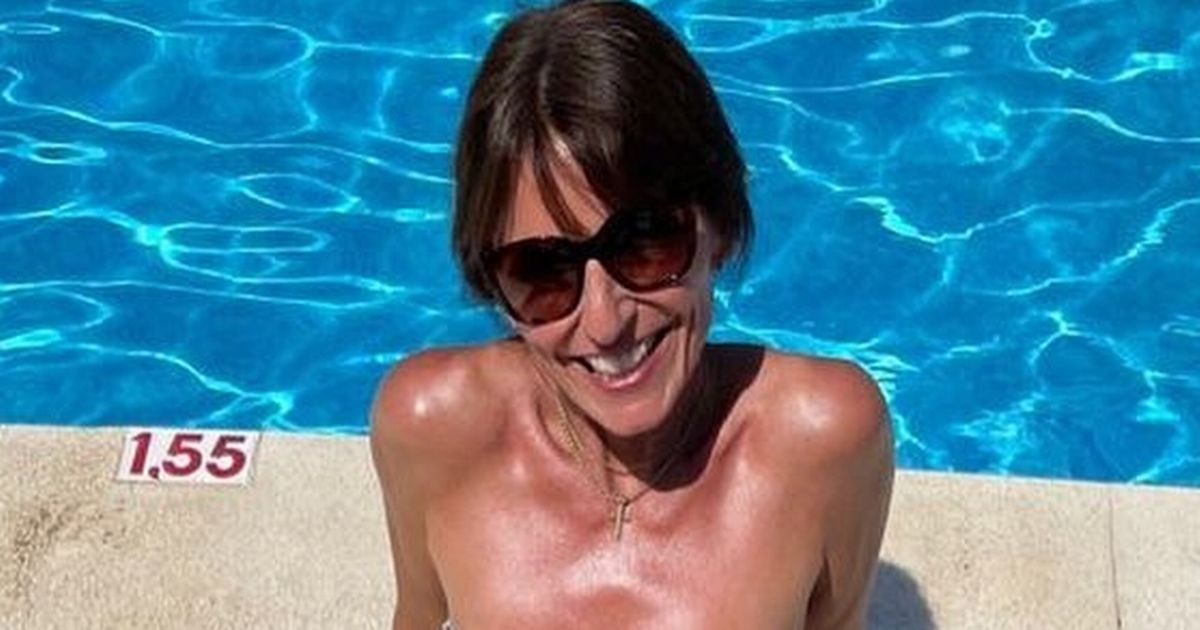 Davina McCall, 53, shows off eye-popping abs in string bikini for sun-soaked display