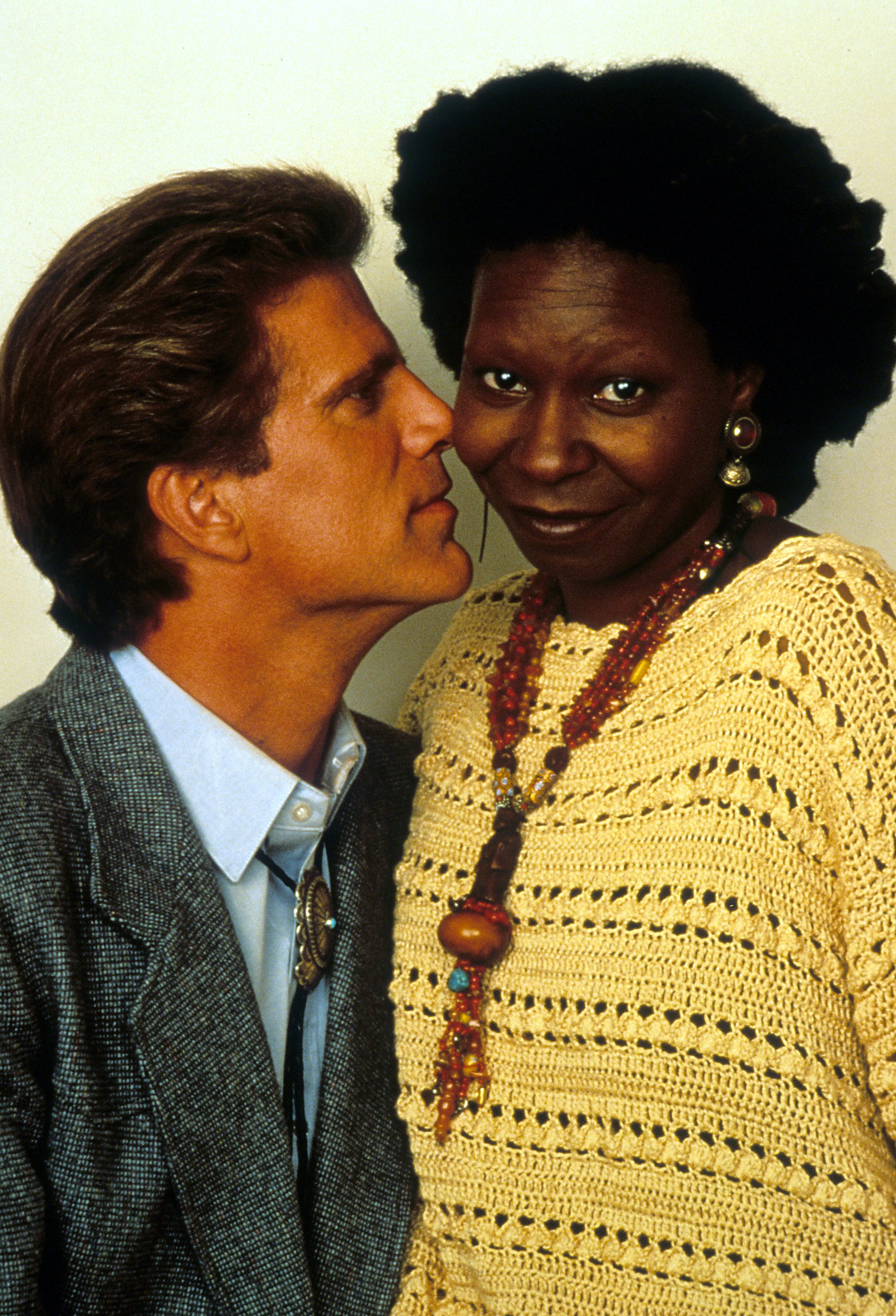 Whoopi Goldberg not amused by Ted Danson's face right up next to her in a scene from the film 'Made In America', 1993. | Source: Getty Images