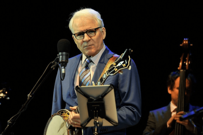 Steve Martin performs with the Steep Canyon Band at Hammersmith Apollo. | Source: Getty Images