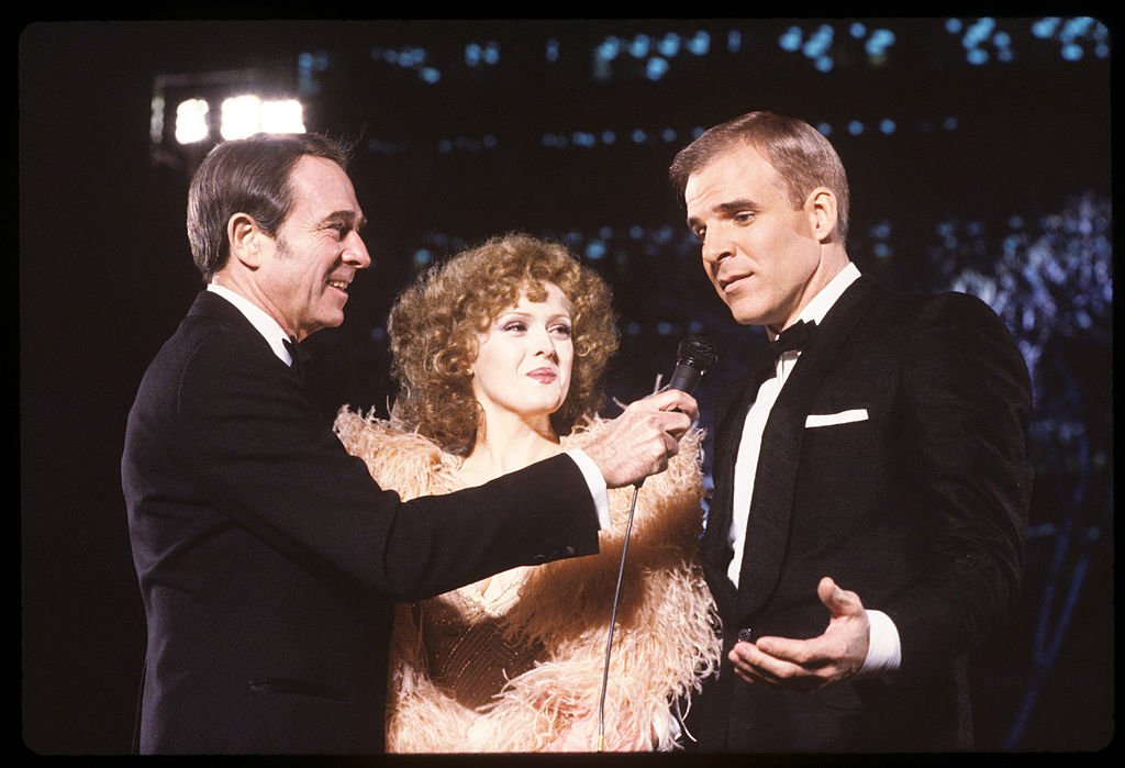 Bernadette Peters, Army Archerd, and Steve Martin pictured at the 53rd Annual Academy Awards. | 