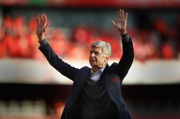 Arsenal manager Arsene Wenger says goodbye to the Arsenal fans after 22 years at the helm at the end of the Premier League match between Arsenal and Burnley at Emirates Stadium on May 6, 2018 in London, England.