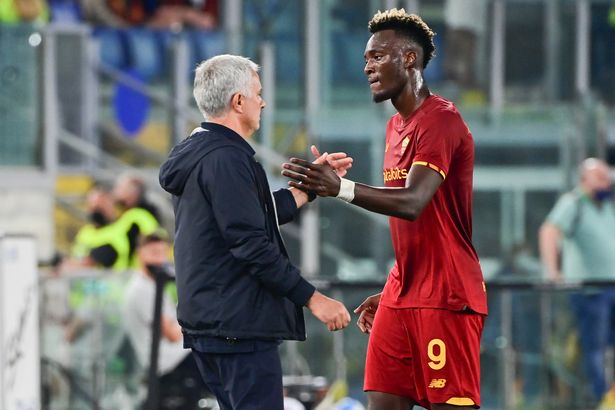 Tammy Abraham and AS Roma coach Josè Mourinho greet during the Serie A match between AS Roma v Udinese Calcio at Stadio Olimpico on September 23, 2021 in Rome, Italy