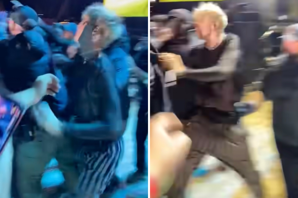 Machine Gun Kelly PUNCHES unruly fan after crowd storms stage and heckles him during Louder Than Life concert