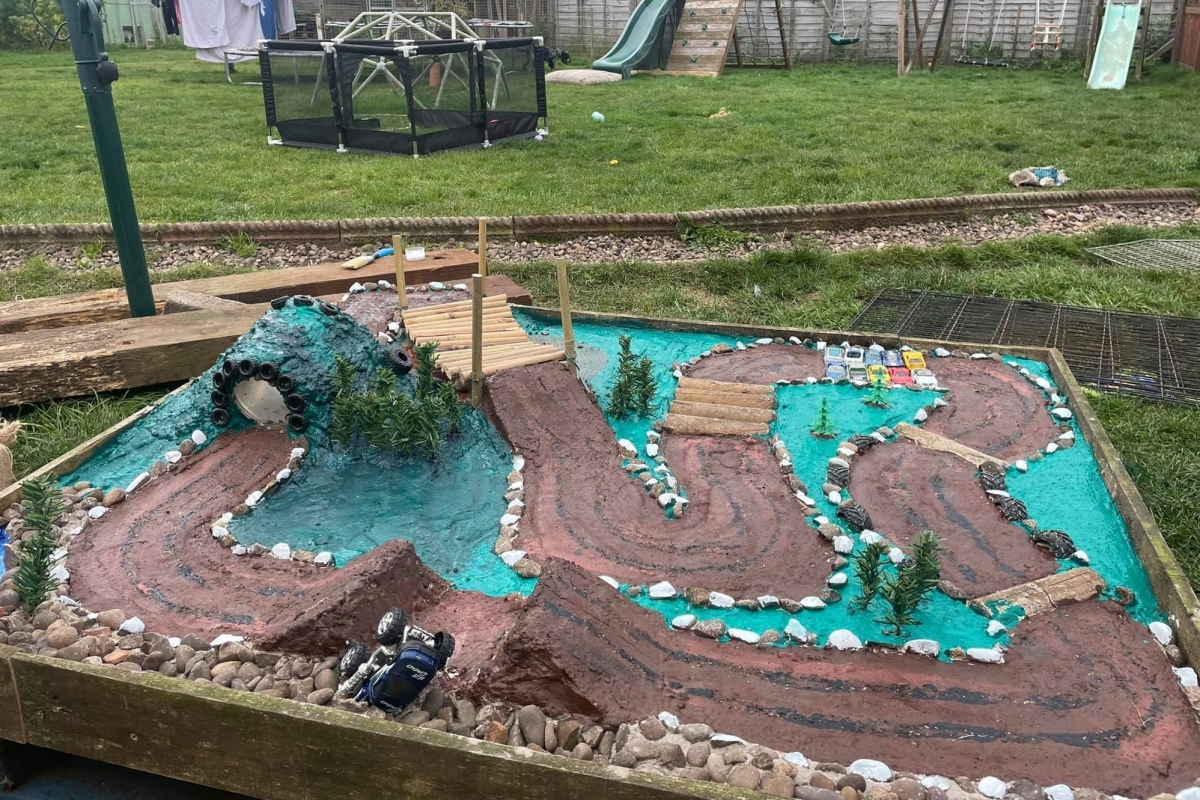 Mum makes epic monster truck track for her kids after getting sick of them tearing up the grass and it only cost £6