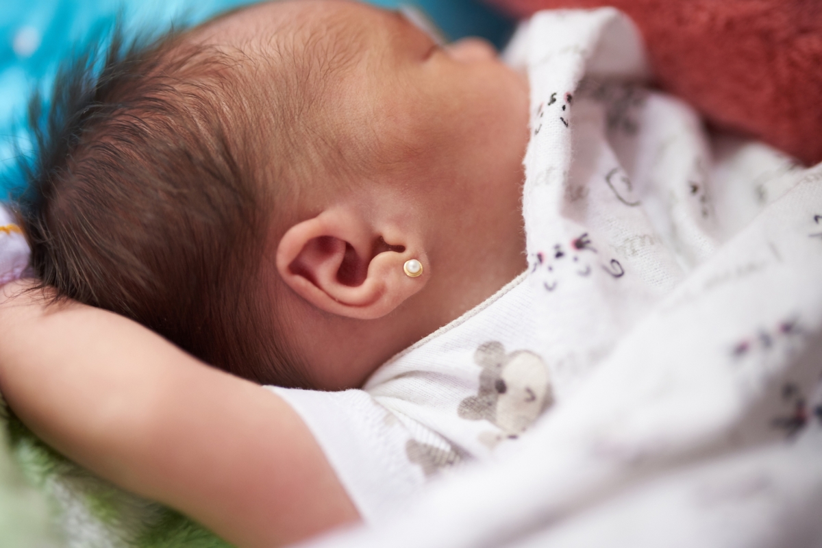 My wife got our two-month-old daughter’s ears pierced behind my back, I took them out, now she says I’m disrespectful