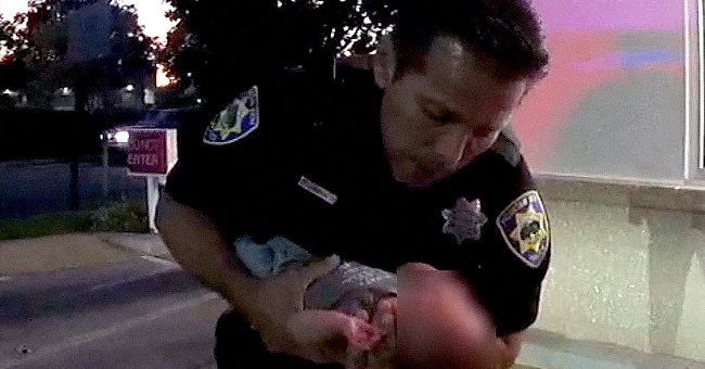 When a patrol officer notices a baby who isn’t breathing or moving, he starts CPR right away.