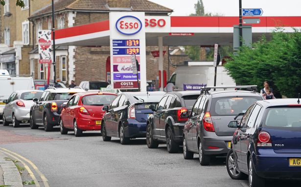 Motorists queue for petrol at an Esso petrol station in Brockley, South London.