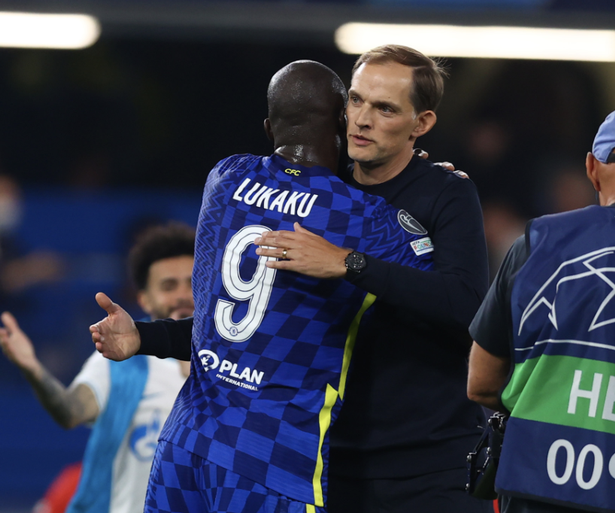 Thomas Tuchel and Romelu Lukaku embrace on the pitch