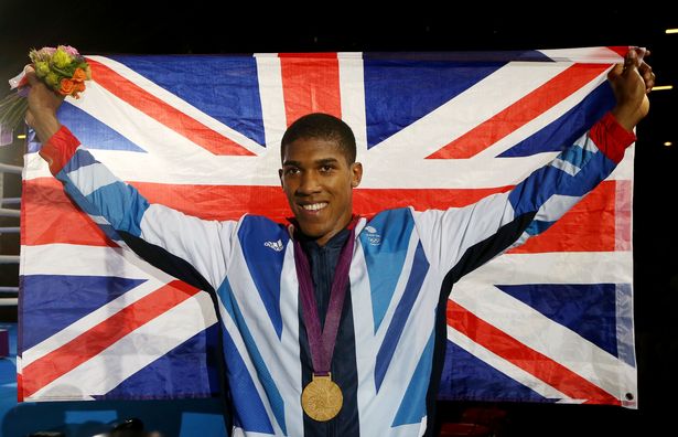 Gold medalist Anthony Joshua of Great Britain celebrates after the medal ceremony for the Men's Super Heavy (+91kg) Boxing final bout on Day 16 of the London 2012 Olympic Games at ExCeL on August 12, 2012 in London, England.