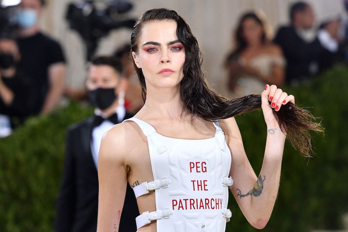Queer woman of color behind ‘Peg The Patriarchy’ says Cara Delevingne didn’t credit her for using the slogan on Met Gala outfit
