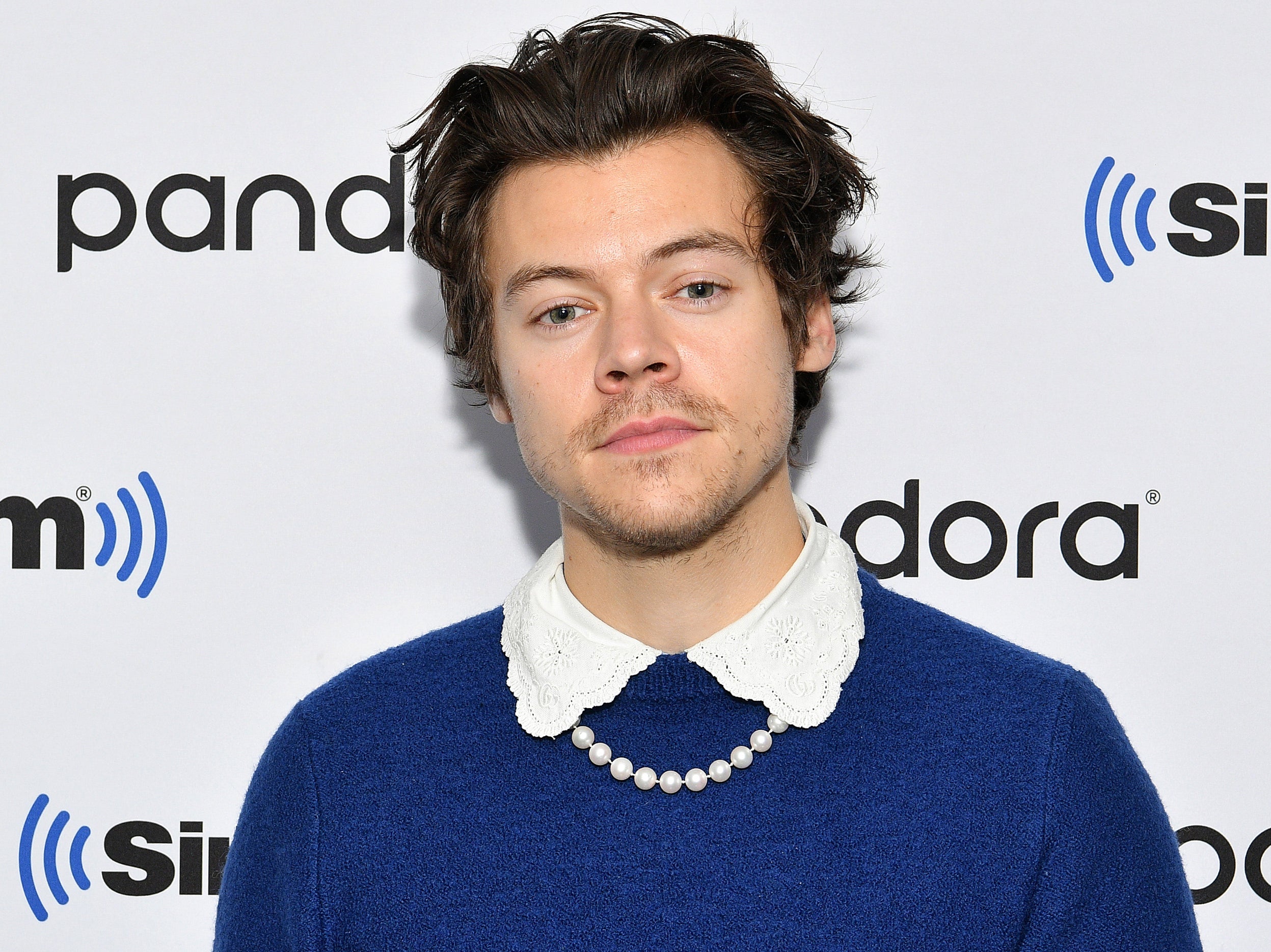 Harry Styles takes a break from gig to reveal his dramatic gender
