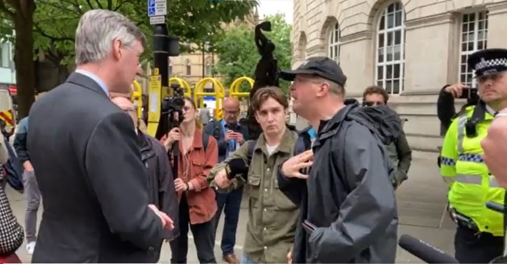 Jacob Rees-Mogg confronted by man with cerebral palsy over ‘shameful’ Tory austerity and benefits policies