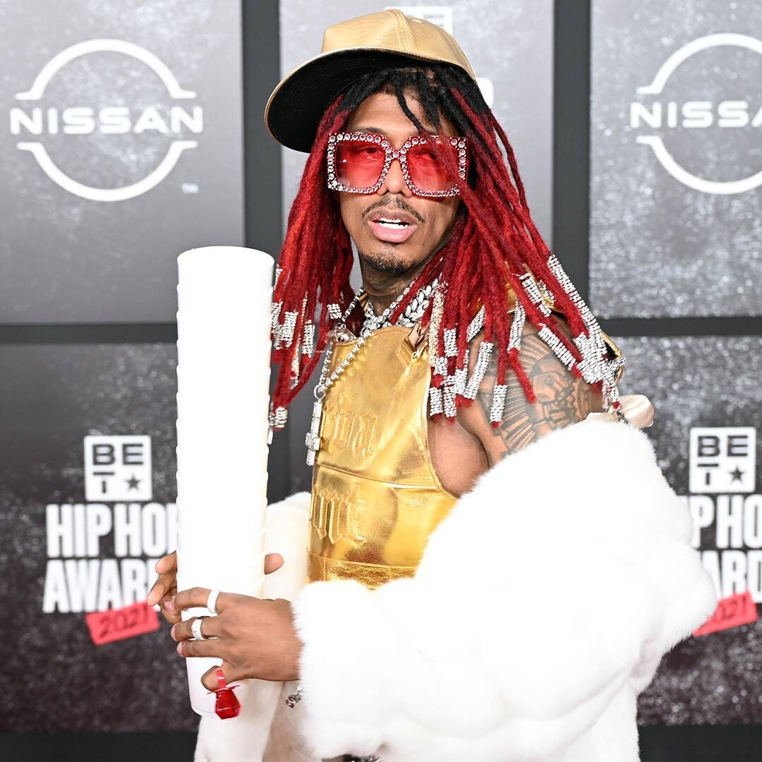 Nick Cannon wears Crocs and a bathrobe at the BET Hip Hop Awards Carpet