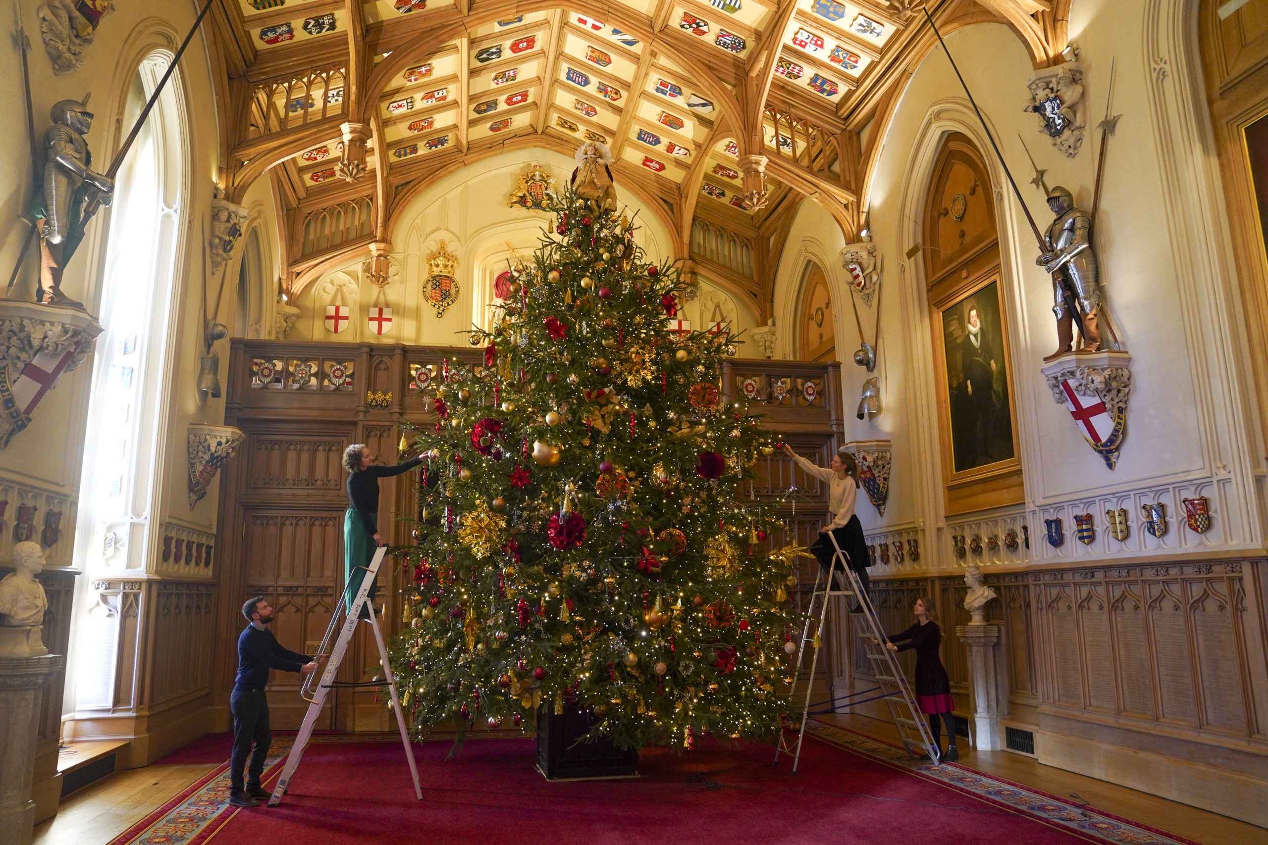 Christmas comes to Windsor Castle with festive trees and Queen’s panto costumes