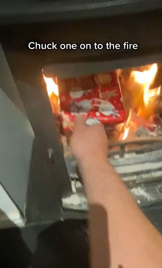 He wraps empty presents and throws them on the fire if the kids misbehave