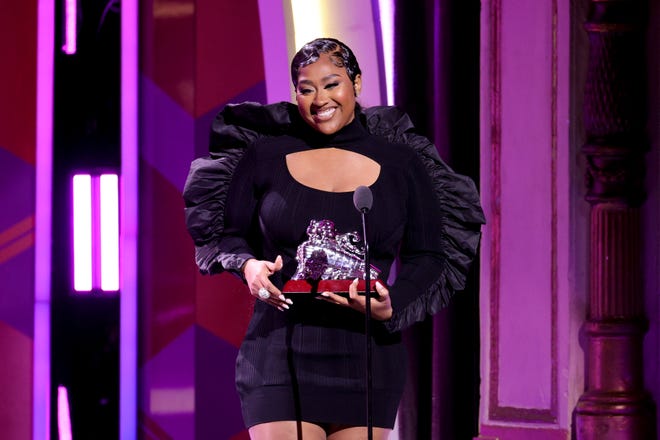 Jazmine Sullivan accepts an award onstage during the 2021 Soul Train Awards at The Apollo Theater on November 20, 2021 in New York City.