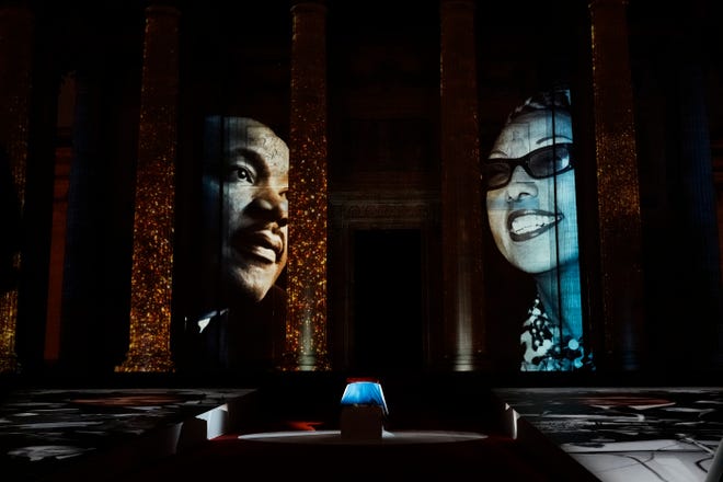 Images of U.S.-born entertainer, anti-Nazi spy and civil rights activist Josephine Baker and Martin Luther King Jr. are projected on the Pantheon monument during a ceremony in Paris on Nov. 30, 2021.