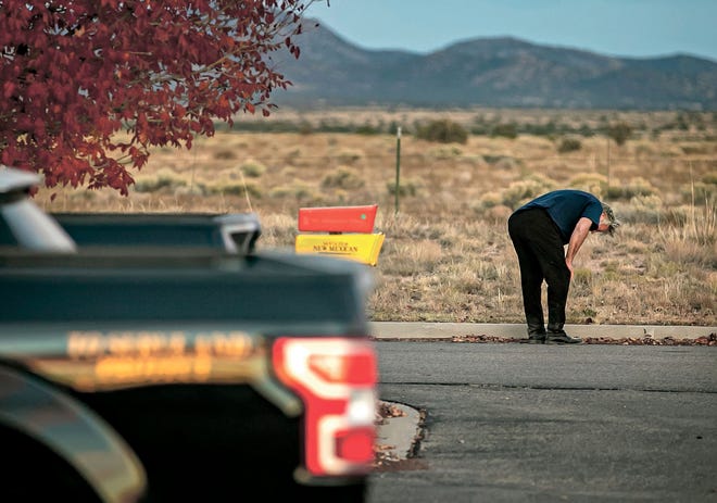 A distraught Alec Baldwin lingers in the parking lot outside the Santa Fe County Sheriff's Office in New Mexico after he was questioned about the shooting on the set of "Rust."
