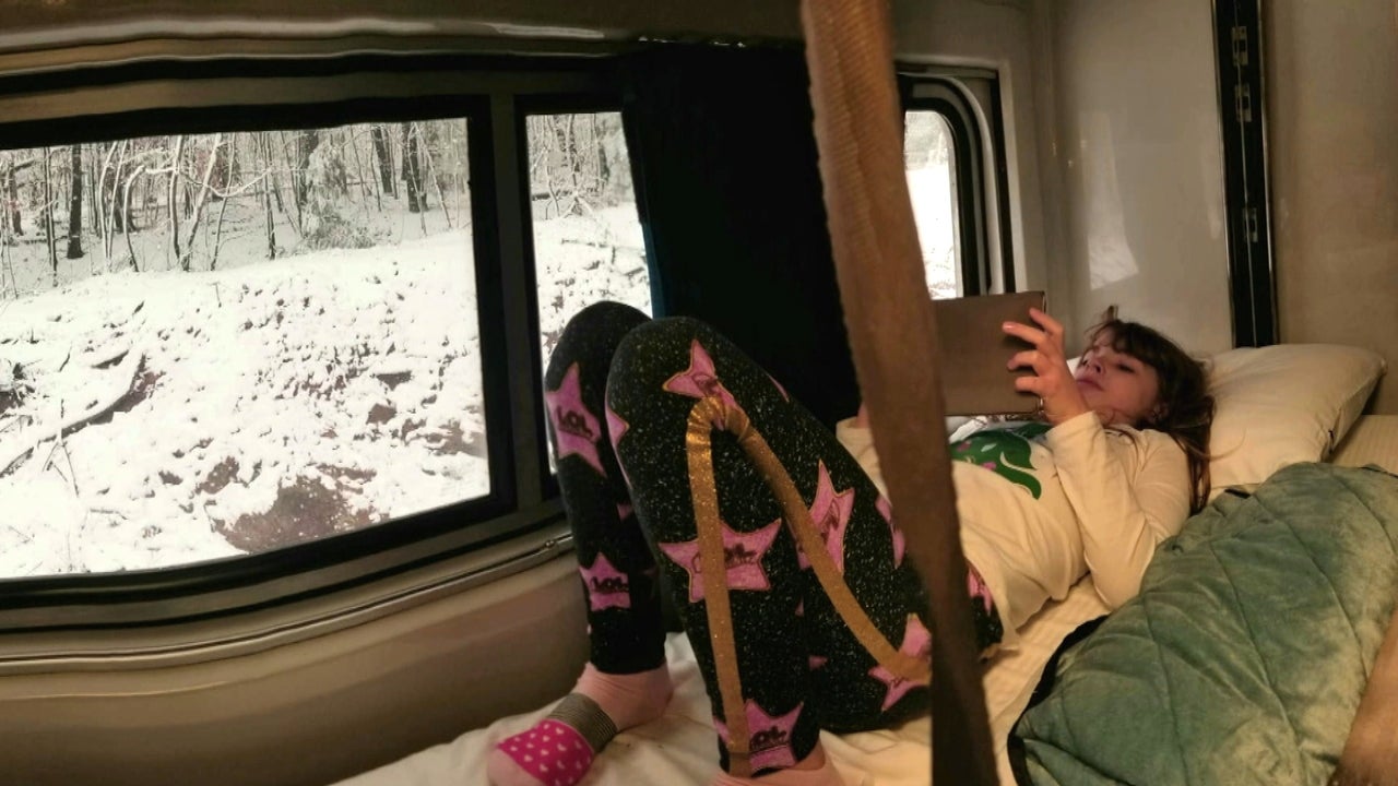 Mom and her 9-year old daughter make the best of being stuck on train for almost 40 hours in snowstorm