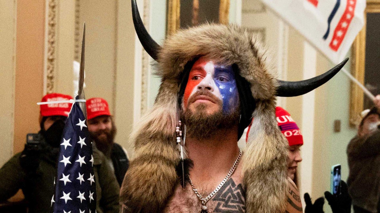 ‘QAnon Shaman,’ Who Carried Spear and Howled Amid Capitol Assault, Says He Tried Unsuccessfully to Calm Crowd