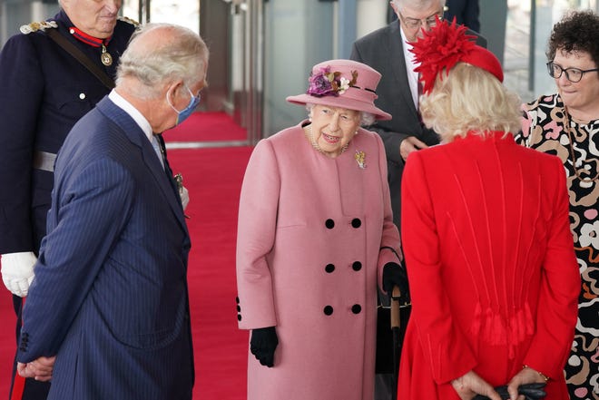 Queen Elizabeth II, her son, Prince Charles, Prince of Wales, and his wife Duchess Camilla of Cornwall, attend the ceremonial opening of the Welsh Parliament, in Cardiff, Wales on Oct. 14, 2021.