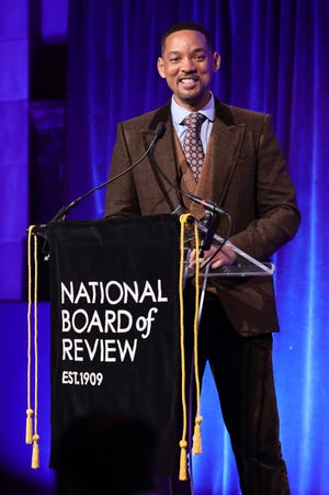 Will Smith accepts the best actor award from NBR for "King Richard."