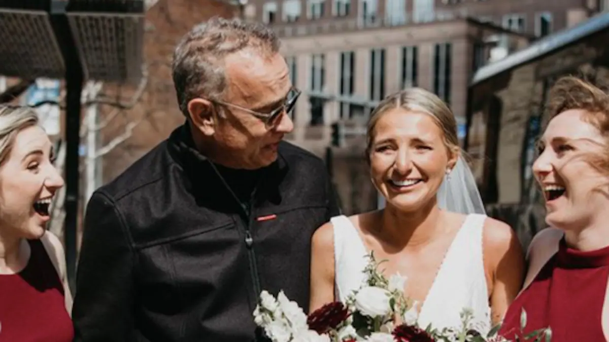 Tom Hanks pulls a Bill Murray and photobombs an unsuspecting bride on her wedding day