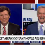 Tucker Carlson Seems Kind of Turned on by Stacey Abrams’ Romance Novels (Video)