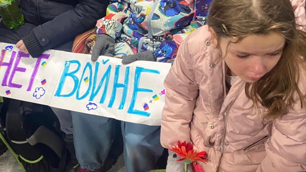 Russian kids arrested for placing flowers, ‘No War,’ banner at Ukrainian Embassy.