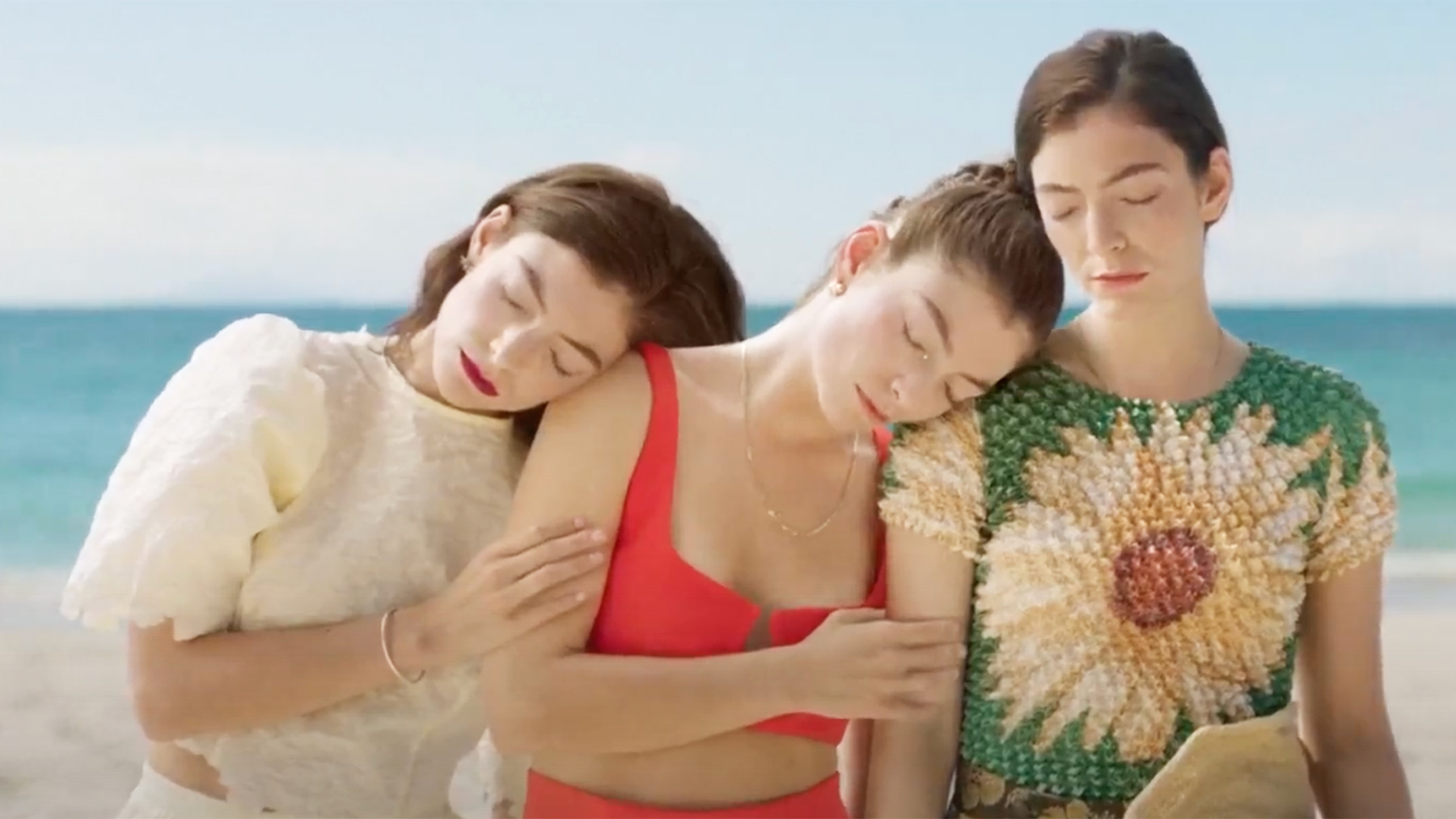 Three versions of Lorde Hit the Beach in a New Video