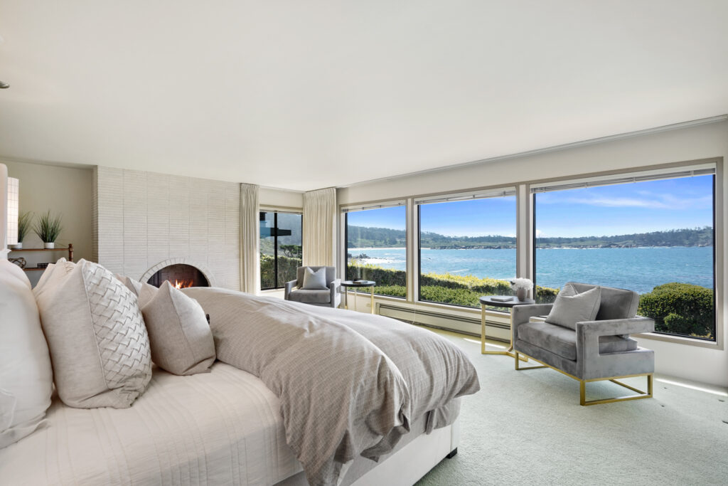 Interior shot of the master bedroom of Betty's White Carmel-by-the-Sea home. 
