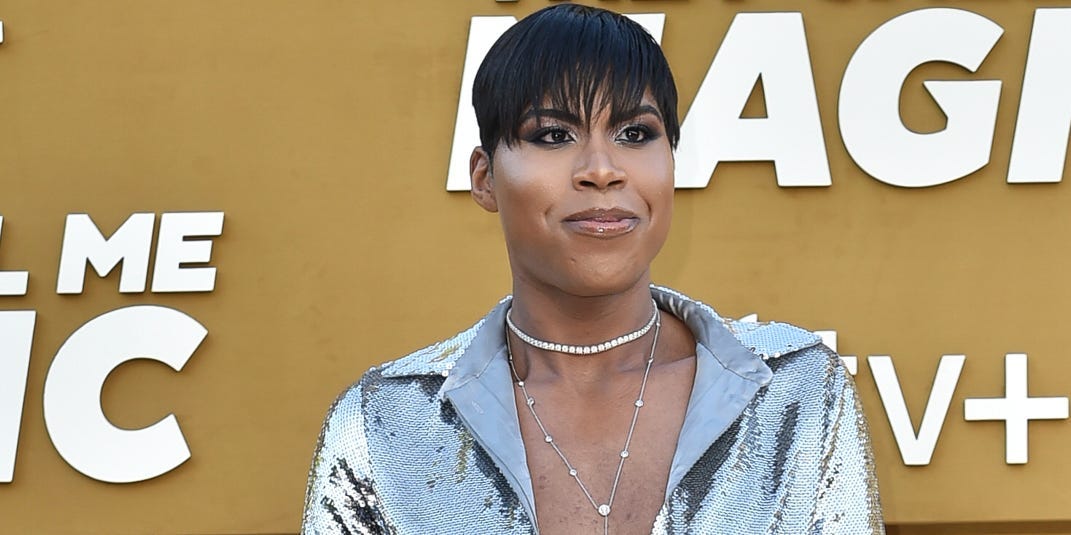 EJ Johnson Wore Silver, Floor-Length Gown to Magic Johnson’s Premiere
