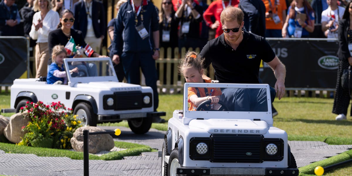 Prince Harry, Meghan Markle Ride in Mini Land Rovers With Kids