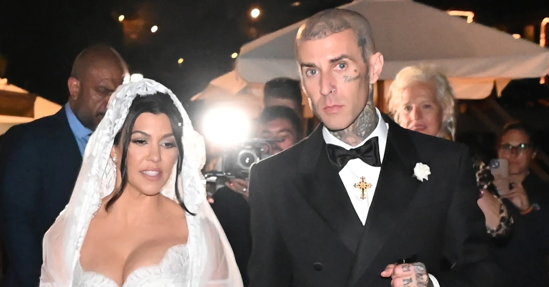 Travis Barker Kisses Kourtney Kardashian’s Foot in New Wedding Photos