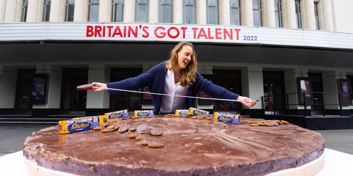 Former Bake Off champion unveils world’s largest Jaffa Cake
