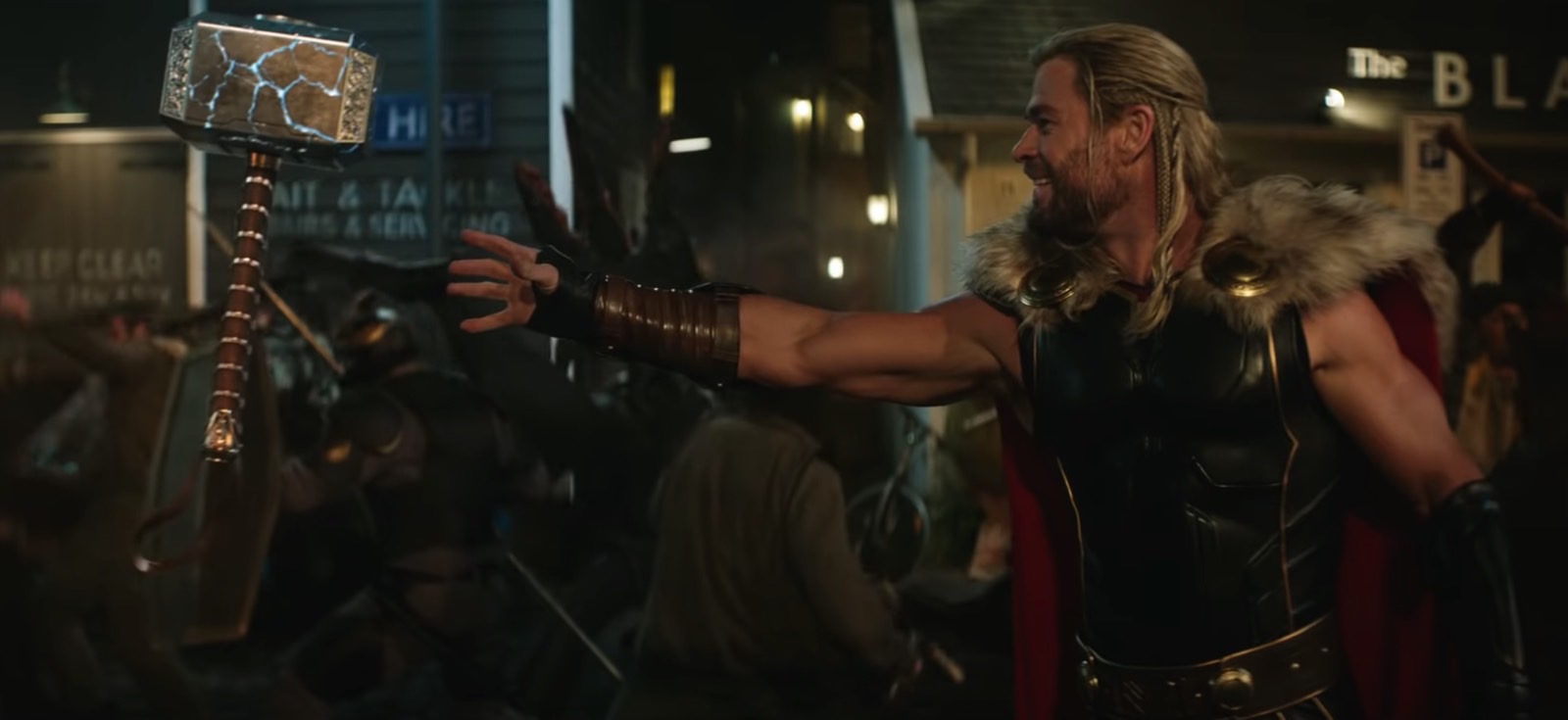 A surprised and excited Thor (Chris Hemsworth) foolishly believing he can get Mjolnir back.