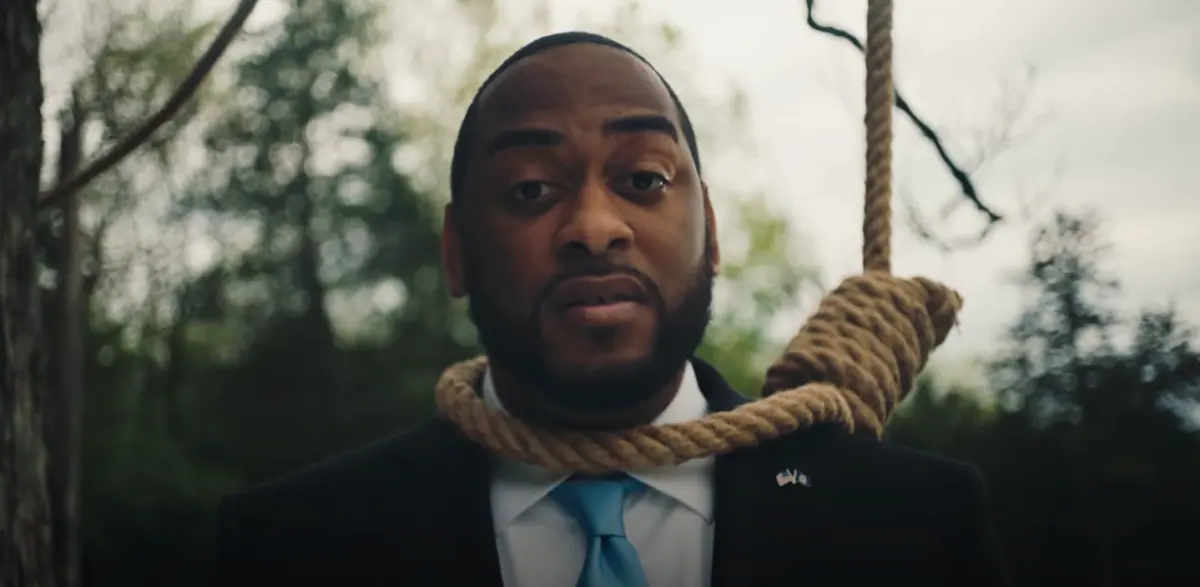 U.S. Senate Candidate Charles Booker Wears Noose in ‘Pain of Our Past’ Campaign Ad (Video)