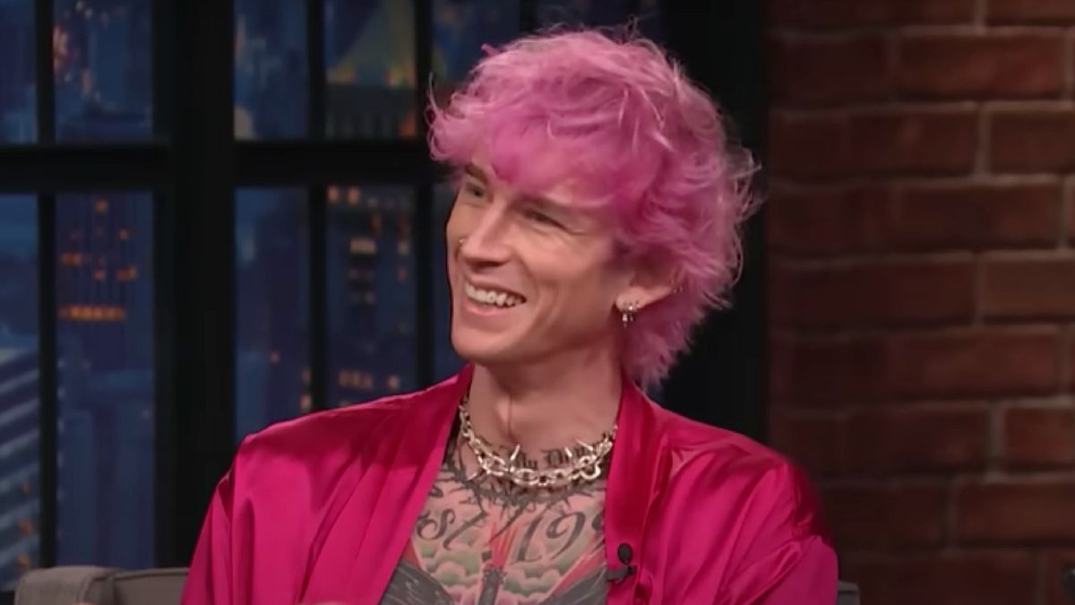 Machine Gun Kelly and Seth Meyers joke about him smashing a Champagne glass against his head. But the Video is Pretty Gnarly