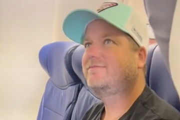 Man shows how to keep plane seat empty next to you - and some call it creepy