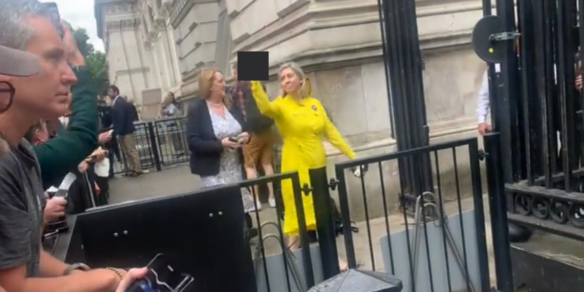 Minister who gave the middle finger to Downing Street crowd: She is ‘only human’