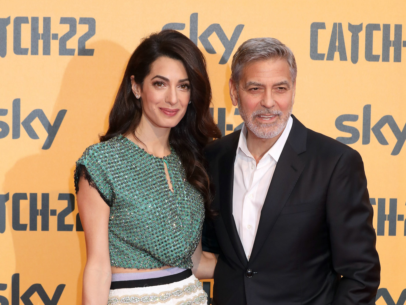 Sketchy Outlet Claims Amal Clooney Supposedly Can’t Get George To Stop Working Amid Health Fears