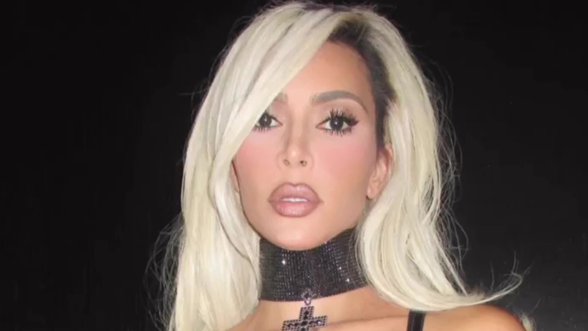 Kim Kardashian almost wore a tiny bra and flaunts a giant choker in a new Dolce & Gabbana video