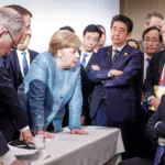 Trump and Angela Merkel’s Stare-Down: Photo From G-7 Sets Internet on Fire